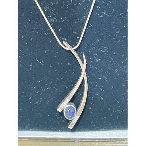 90a - 18ct sapphire & Diamond pendant and chain