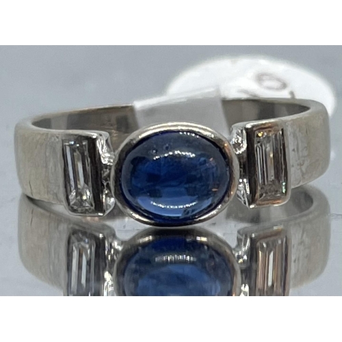 91 - 18ct sapphire & diamond ring