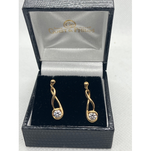 83 - 18ct drop cz earrings