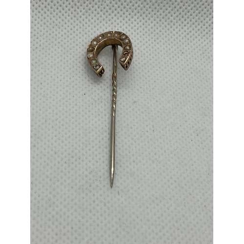 146 - antique 9ct gold pearl seed and diamond horseshoe pin.