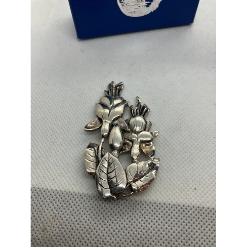 147 - 2x Maureen Story-Jones silver plated brooches.