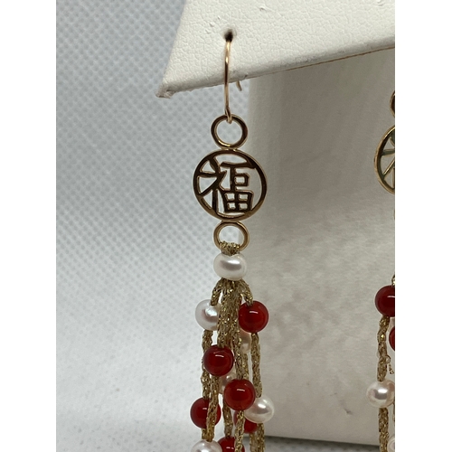 149 - 18ct gold pearl and garnet drop earrings with Chinese 