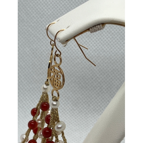 149 - 18ct gold pearl and garnet drop earrings with Chinese 