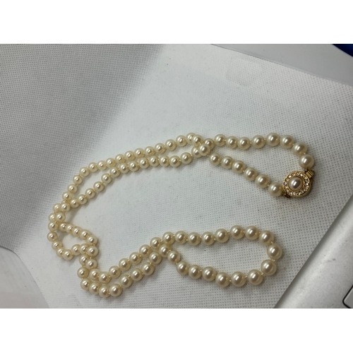 155 - Faux pearl necklace with cz clasp