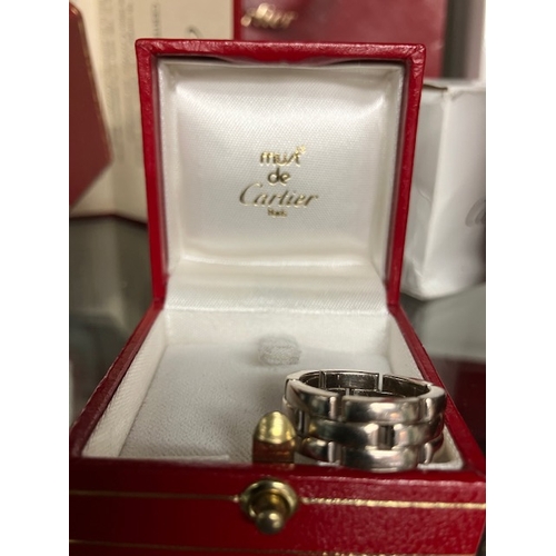 227 - Cartier panthers Maillon ring in 18ct white gold.