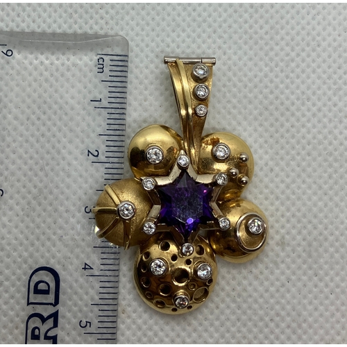 199 - 18ct diamond and amethyst designer pendant