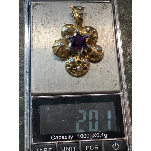 199 - 18ct diamond and amethyst designer pendant