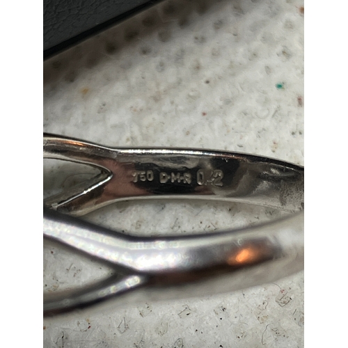 180 - 18ct white gold designer onyx and diamond ring