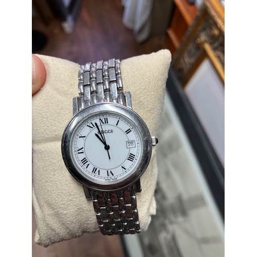 94 - Steel Gucci watch