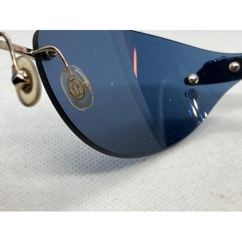 12 - Rare Cartier Panthere sunglasses. these come with the blue lenses.