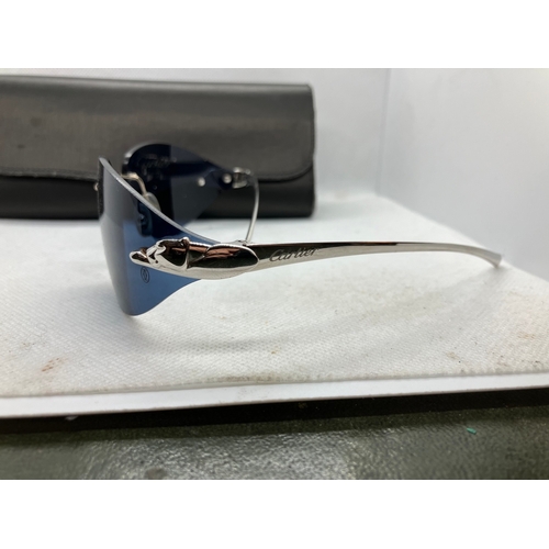 12 - Rare Cartier Panthere sunglasses. these come with the blue lenses.
