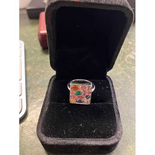 47 - Designer sterling silver and gemstone ring