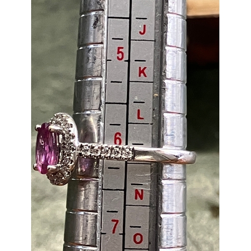 59 - 18ct white gold pink sapphire and diamond ring