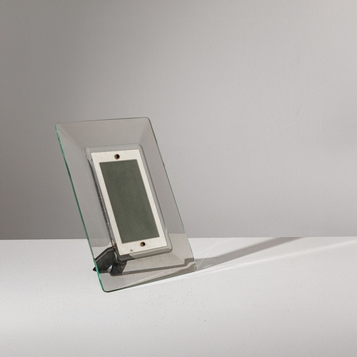 149 - PIETRO CHIESAPortafoto. Legno ebanizzato, ottone, cristallo molato, cristallo parzialmente specchiat... 