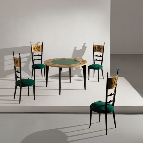 155 - ALDO TURAQuattro sedie e un tavolo. Legno rivestito in pergamena, tessuto imbottito. Produzione Tura... 