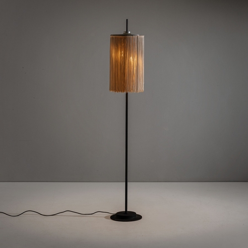 162 - GINO SARFATTILampada da terra mod. 1076/N. Metallo goffrato, alluminio lucidato, frangia sintetica. ... 