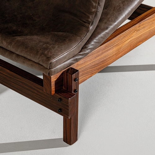 170 - JOE COLOMBOCoppia di poltrone. Pelle imbottita, legno esotico, metallo verniciato. Produzione Lenzi,... 