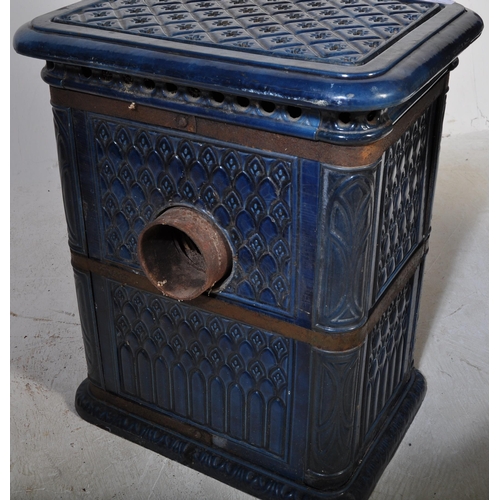 13 - An early 20th Century French cobalt blue enamel wood burner stove. Lattice top with classical decora... 