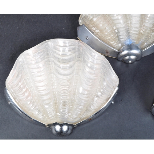 52 - A matching set of three vintage Art Deco clam shell frosted glass wall sconce lamp lights. Each with... 