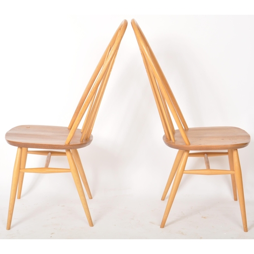 55 - Ercol - Swan Pattern - A matching set of four retro 20th Century light beech and elm dining chairs h... 