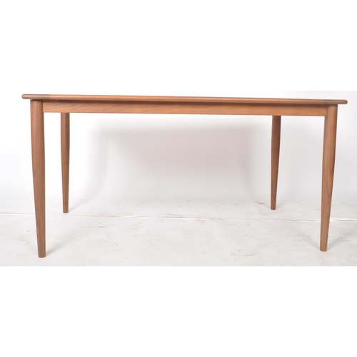 A contemporary retro style walnut dining table of rectangular form