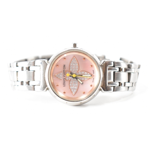 A ladies Louis Vuitton stainless steel wrist watch. The watch