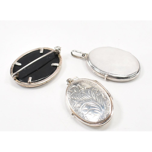 203 - Silver 925 and blue stone locket pendant with chase decoration, bale atop. Together with another sil... 