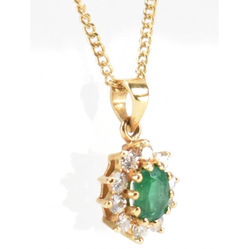 205 - A hallmarked 18ct gold emerald and diamond cluster pendant necklace.  Weight 3.2g. Estimated diamond... 