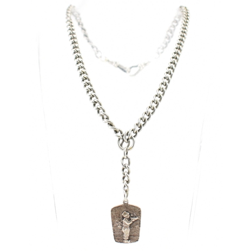 207 - Early 20th century silver albert pocket watch chain adorned with a Dutch silver pendant of boy with ... 