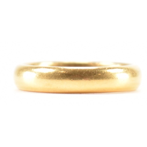 218 - A hallmarked 22ct gold wedding band ring. Makers marks W.M. Assay marked for Birmingham. Date letter... 