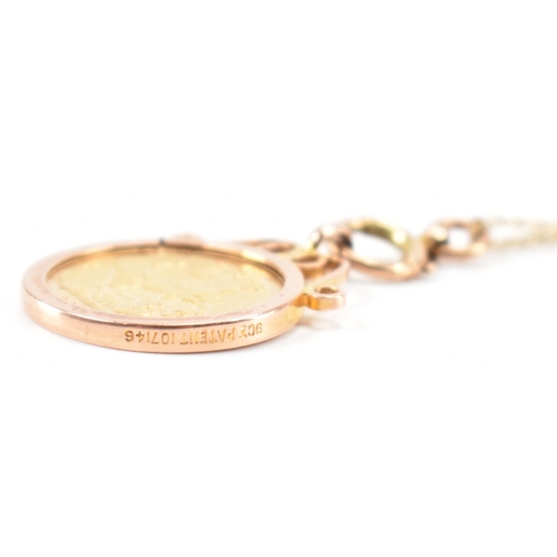 219 - A 19th Century Victorian 1889 gold sovereign coin set within a 9ct gold mount on a fine link necklac... 