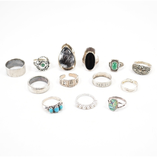 229 - A collection of vintage silver dress rings. The lot to include; band rings, stone set rings, hallmar... 