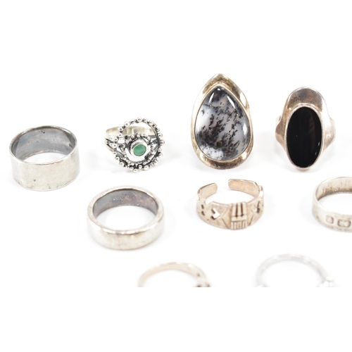 229 - A collection of vintage silver dress rings. The lot to include; band rings, stone set rings, hallmar... 