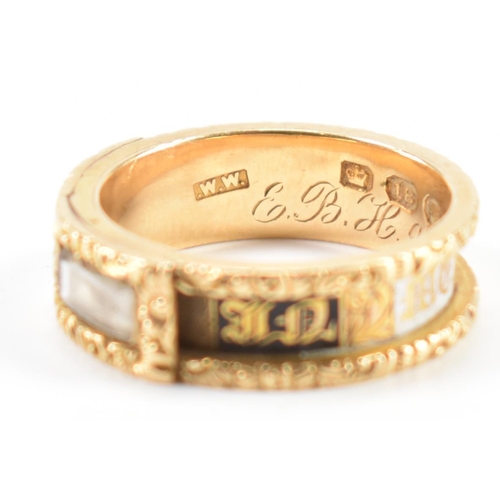 230 - A 19th Century Victorian hallmarked 18ct gold and enamel mourning ring. The ring having engraved flo... 