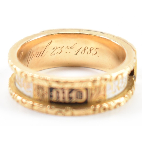 230 - A 19th Century Victorian hallmarked 18ct gold and enamel mourning ring. The ring having engraved flo... 