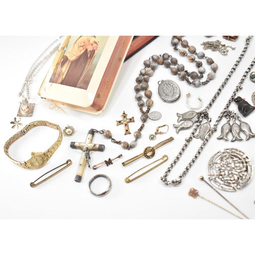 239 - An assortment of Victorian and later costume jewellery. The lot to include a Victorian mourning broo... 