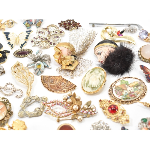 240A - A collection of vintage brooches. The lot to include cameo brooch, mid century brooches, enamelled o... 