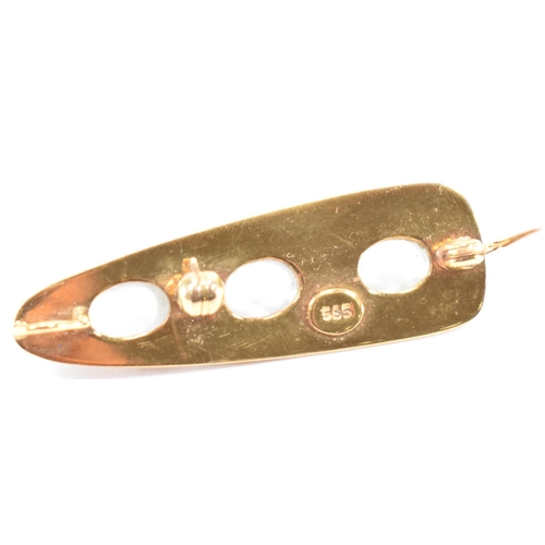 240 - A gold and moonstone pendant brooch. The brooch of brushed triangular form set with three oval moons... 