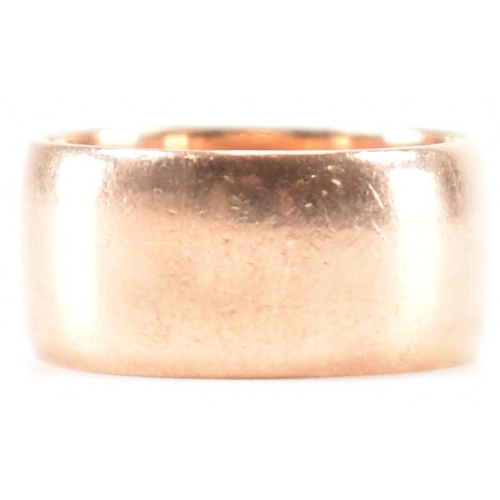 241 - A hallmarked 9ct gold band ring of D form. Makers mark W.M. Stamped 375. Assay marked for Birmingham... 