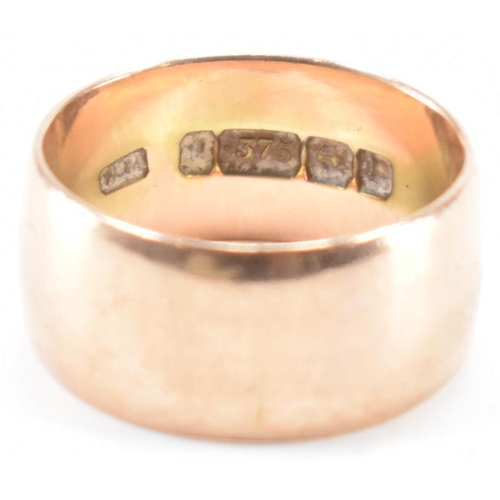 241 - A hallmarked 9ct gold band ring of D form. Makers mark W.M. Stamped 375. Assay marked for Birmingham... 