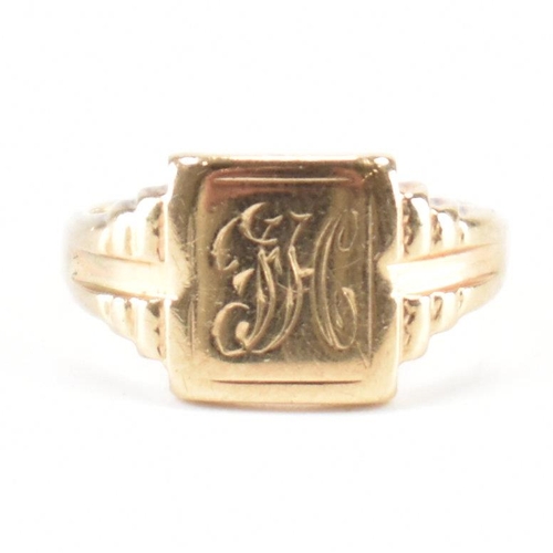 245 - A hallmarked 9ct gold children's signet ring. The ring having engraved initials to square head with ... 