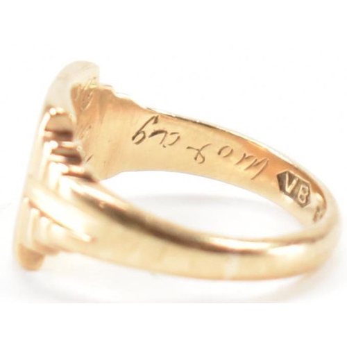 245 - A hallmarked 9ct gold children's signet ring. The ring having engraved initials to square head with ... 