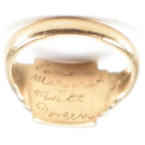 245 - A hallmarked 9ct gold children's signet ring. The ring having engraved initials to square head with ... 