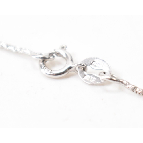 260a - A 18ct white gold and diamond pendant necklace. The necklace having a fine snake chain necklace with... 