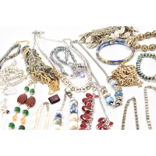 280a - A collection of vintage costume jewellery. The lot to include a scarab beetle necklace, baroque pear... 