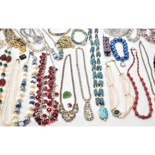 280a - A collection of vintage costume jewellery. The lot to include a scarab beetle necklace, baroque pear... 