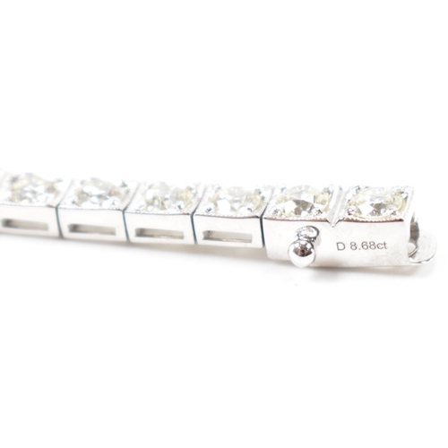 280 - An 18ct white gold and diamond tennis bracelet. The bracelet set with 36 round brilliant cut diamond... 