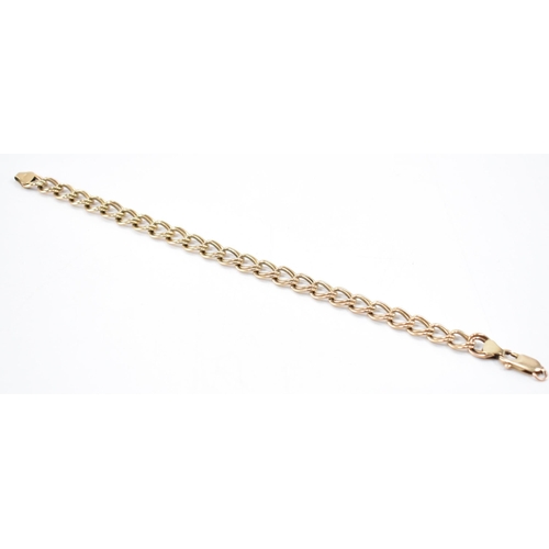 309 - A hallmarked 9ct gold double link chain bracelet.  The bracelet having a lobster claw clasp. Clasp r... 