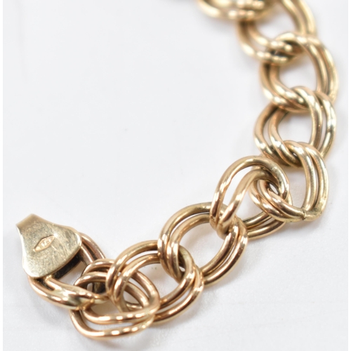 309 - A hallmarked 9ct gold double link chain bracelet.  The bracelet having a lobster claw clasp. Clasp r... 