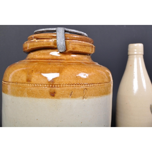 1157a - A collection of vintage 20th Century two tone stoneware lidded jars and bottles. Some white vase / b... 